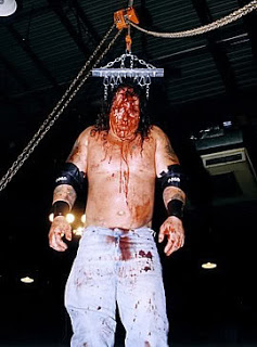 CZW John Zandig was hung by skin from meat hooks